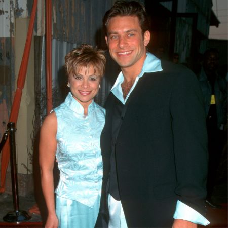 Paula's and Her husband Brad Becjerman holding hand 